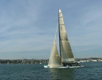 America's Cup challenger at full sail in San Diego Harbor.